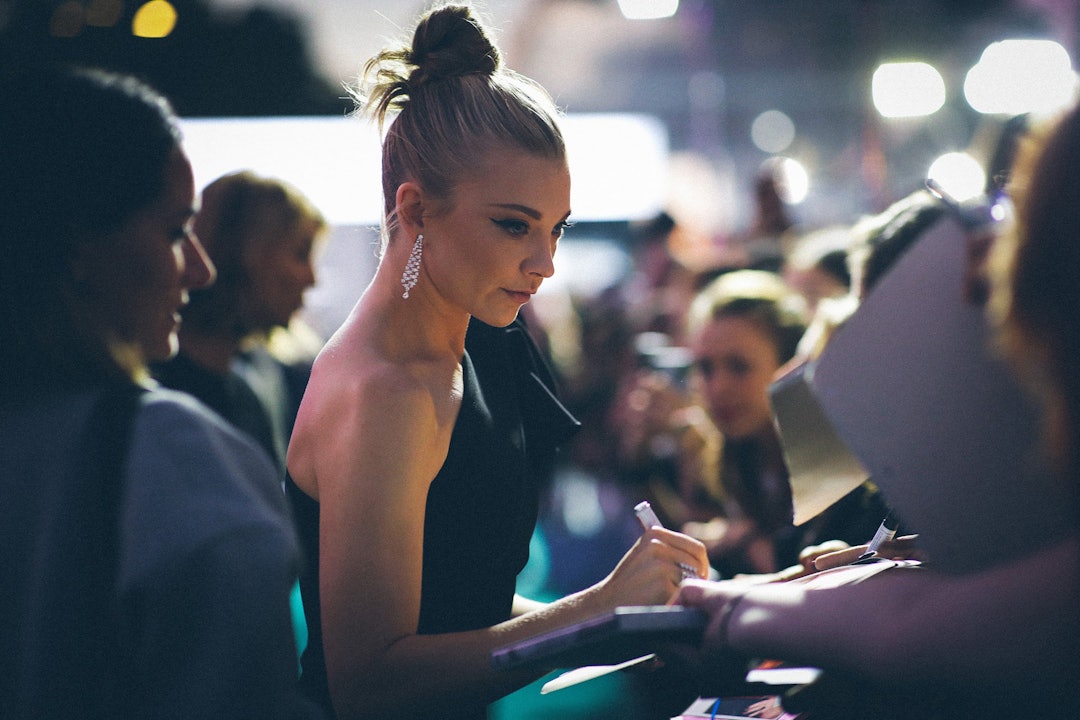 Stars signing autographs.